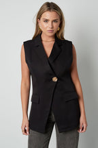 De mouwloze blazer